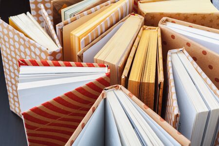 Many Books Piles. Close up.