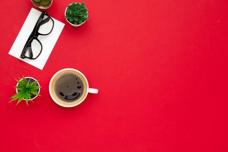 Modern workplace with cup of coffee, top view. Close up.の写真素材