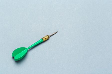 One single dart arrow on light gray background