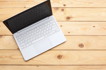 Office desk table with laptop computer