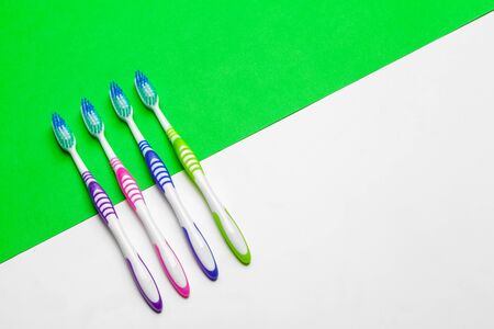toothbrush on green background, dental care concept. Close up.の写真素材