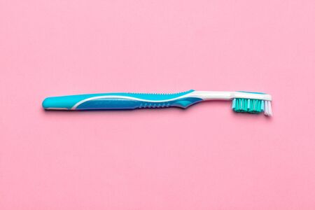 Toothbrushes on pink background. Close up.の写真素材