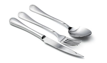 Spoon, knife and fork isolated on white background. Close up.
