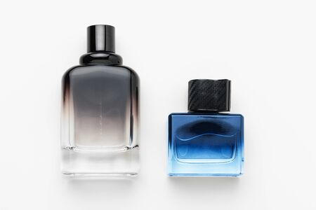 Set of luxury perfume bottles. Isolated on white background. Close up.