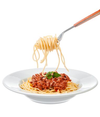 Spaghetti bolognese sauce with beef or pork,cheese,tomatoes and spices on white plate. Close up.の写真素材