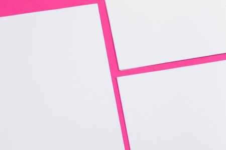 mock up concept. cards Papers on pink background. Top view, flat lay, copy space. Close up.の写真素材