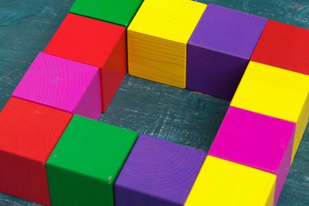 Colorful wooden blocks background, top view. Close up.