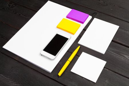 Blank stationery set on wood background paper, business cards, booklet, sheets, etcの写真素材