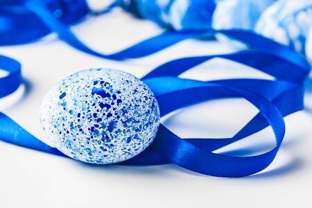 blue Easter eggs isolated on white. Close up.の写真素材