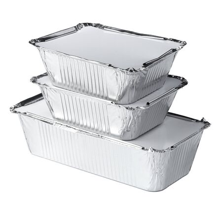 Packed foil food boxes on white background, copy spaceの写真素材