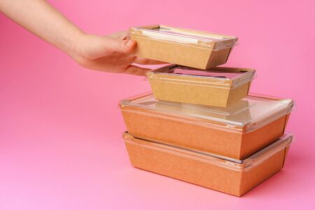 Delivery man hands giving food containers and packages