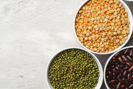 Beans assortment on white stone table