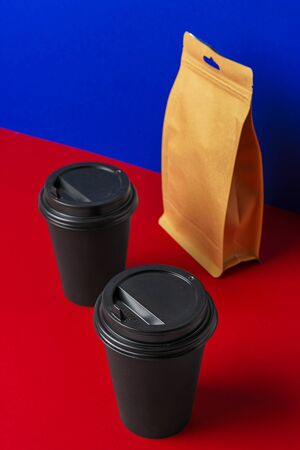 Takeaway food concept. Some packed food in container with coffee cup on tableの写真素材