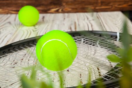 Tennis equipment on wooden surface. Macro photo. Close up.の写真素材