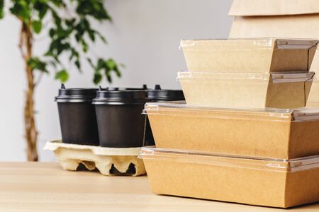 Assortment of various food delivery containers on table close upの写真素材