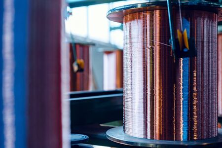 Production of copper wire, cable in reels at factory. Cable factory.の写真素材