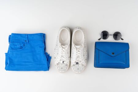 Flat lay of woman summer outfit on white background. Close up.の写真素材