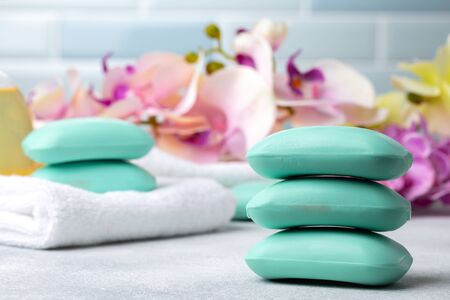 Bar of natural handmade soap, towel and spa objects, close upの写真素材