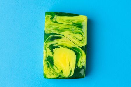 Soap for hand washing on a blue background.