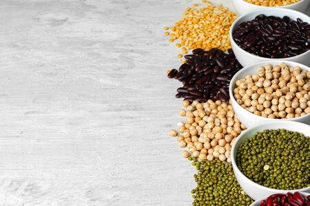 Beans assortment on white stone table, close up.の写真素材