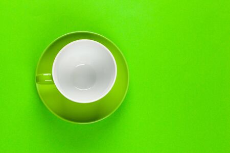 Flat lay view coffee or tea cup on color background. Close up.の写真素材