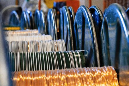 Production of copper wire, cable in reels at factory. Cable factory.の写真素材