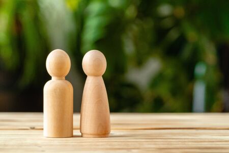Wooden little figures of people. Family conceptの写真素材