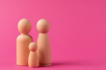 Wooden little figures of people. Family conceptの写真素材