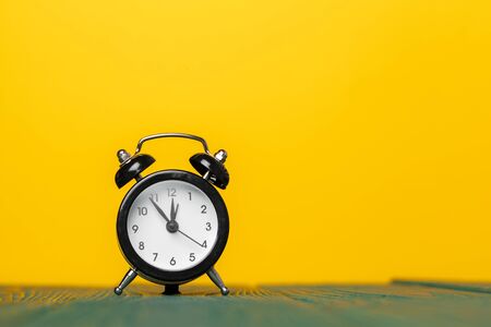 retro alarm clock on table