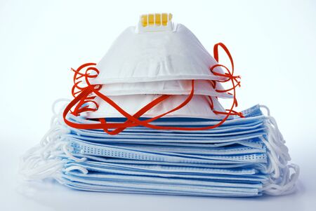 Face mask protection and medical surgical masks on white backgroundの写真素材