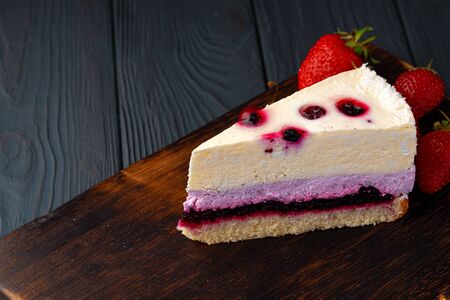 Soft berry souffle cake decorated with fresh berries close upの写真素材