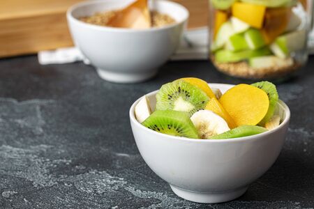 Healthy food: porridge with fruit on the table. Close up.の写真素材