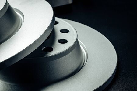 Car break disc on black background close up