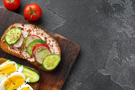 Healthy sandwich with cream cheese and cucumbers, top viewの写真素材