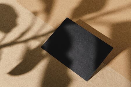Black business cards on cork board tableの写真素材