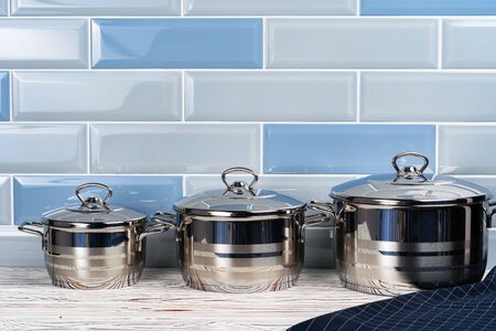 Close up photo of cookware set on wooden kitchen counterの写真素材