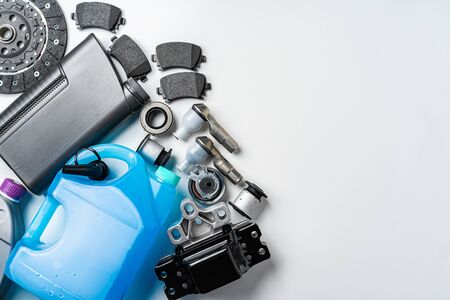 New metal auto parts on grey backgroundの写真素材