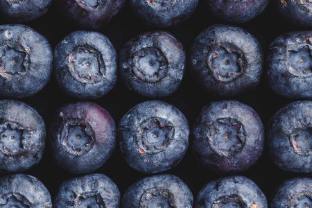 Texture blueberry berries close up. Ripe blueberry backgroundの写真素材
