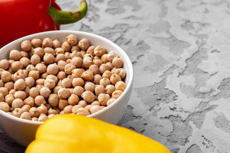 Bowl of raw cereal on table close up, copy spaceの写真素材