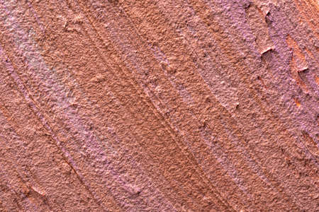 Textured smears of dark skin foundation, background. close up.の写真素材
