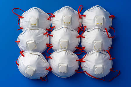 White medical mask for protection against viruses and pollution