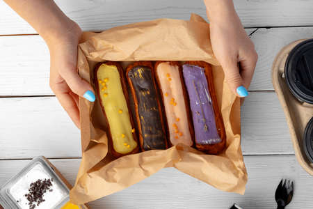 Group of colorful eclair cakes close upの写真素材