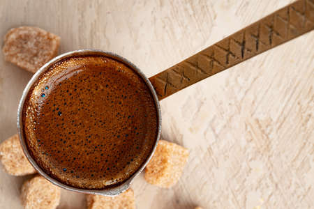 Turkish coffee with foam in copper turk close upの写真素材