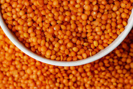 White ceramic bowl of red lentils