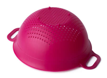 New plastic kitchen colander isolated on whiteの写真素材