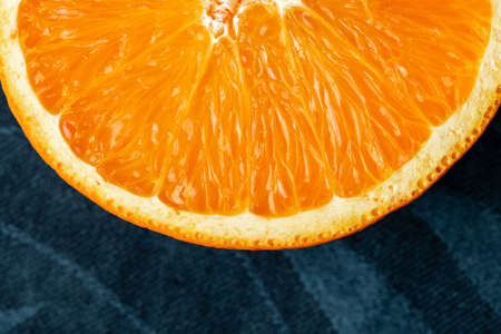 Sliced half of juicy orange close up