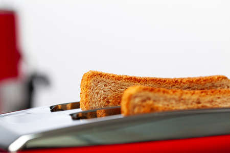 Couple of prepared toasts in a toasterの写真素材
