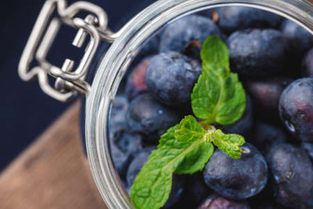 Blueberries in a glass bowl close upの写真素材
