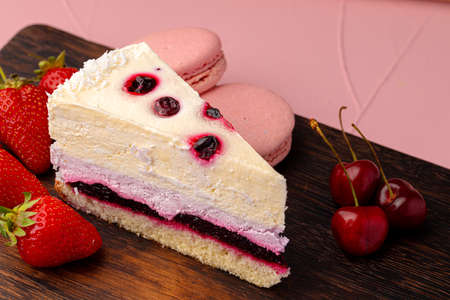 Soft berry souffle cake decorated with berries