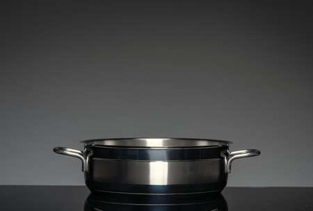 New cookware on black background, front viewの写真素材